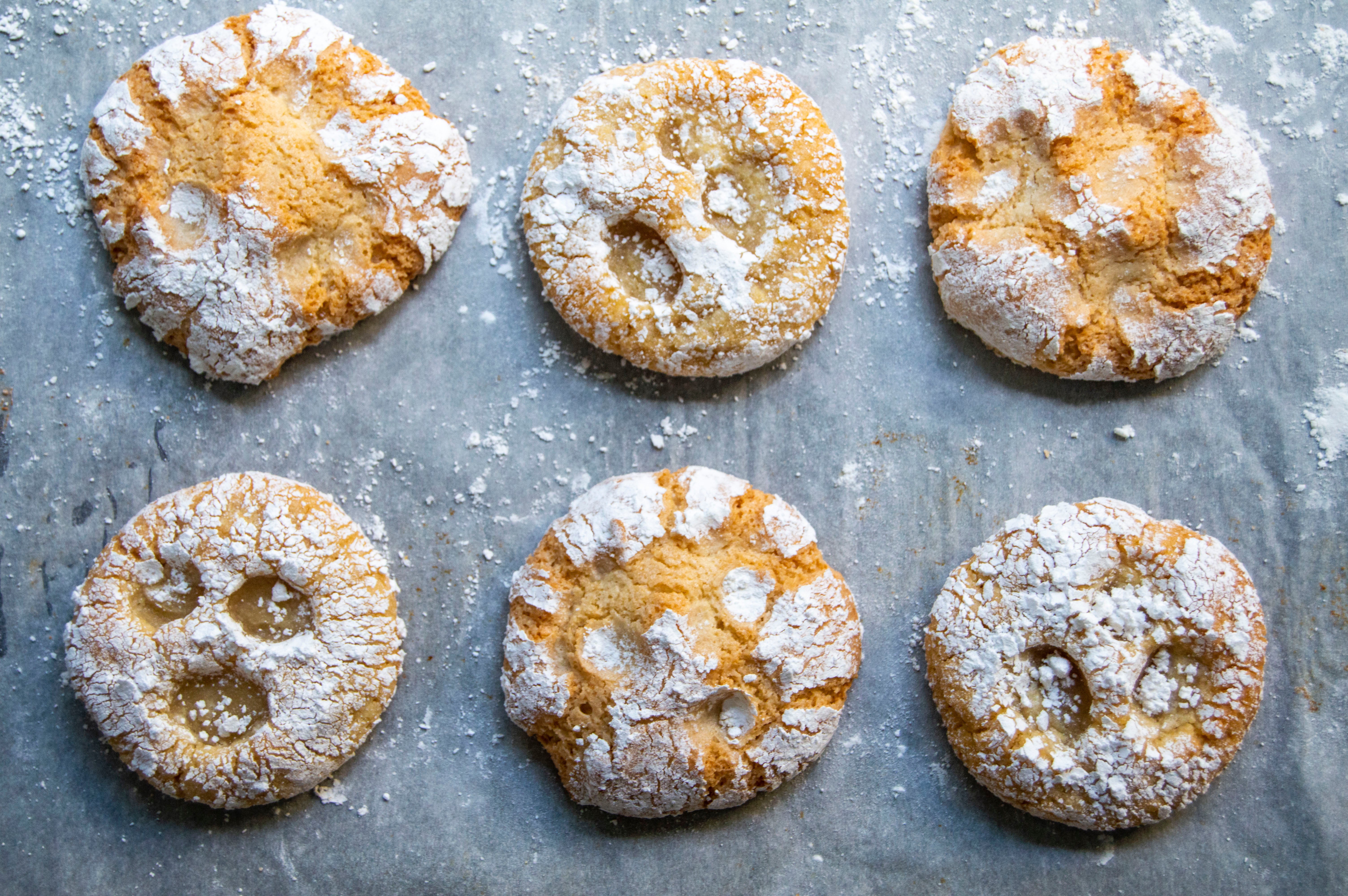 Two versions of Almond Cloud Cookies: one normal, one with prominent indentions visible